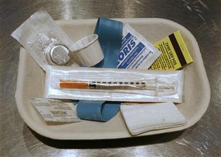 Small kit of supplies waits to be used by drug addicts visiting safe injection site in Vancouver