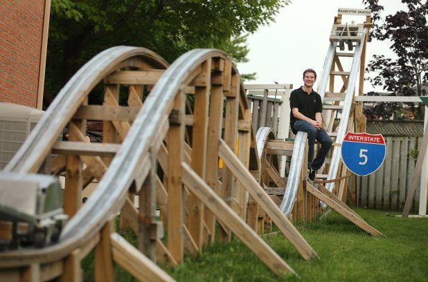 Queen's University engineering student David Chesney has built a 28 metre-long rollercoaster out of parts and material anybody can get from any hardware store in his parents' Thornhill backyard. The ride starts on a 12 foot incline and goes over a pair of