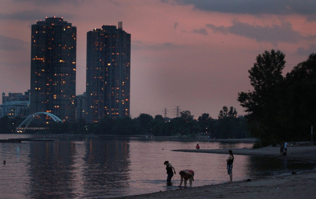 Torontonians gather on at Sunnyside on the Western beaches to beat the heat