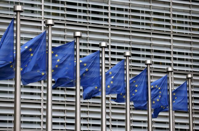 European Union flags flutter outside the EU Commission headquarters in Brussels, Belgium, in this file picture taken October 28, 2015. REUTERS/Francois Lenoir/Files