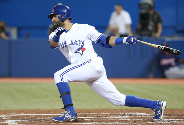 TORONTO, CANADA - JULY 5:  Jose Bautista #19 of the Toronto Blue Jays hits a single in the first inning during MLB game action against the Minnesota Twins on July 5, 2013 at Rogers Centre in Toronto, Ontario, Canada.  (Photo by Tom Szczerbowski/Getty Images)