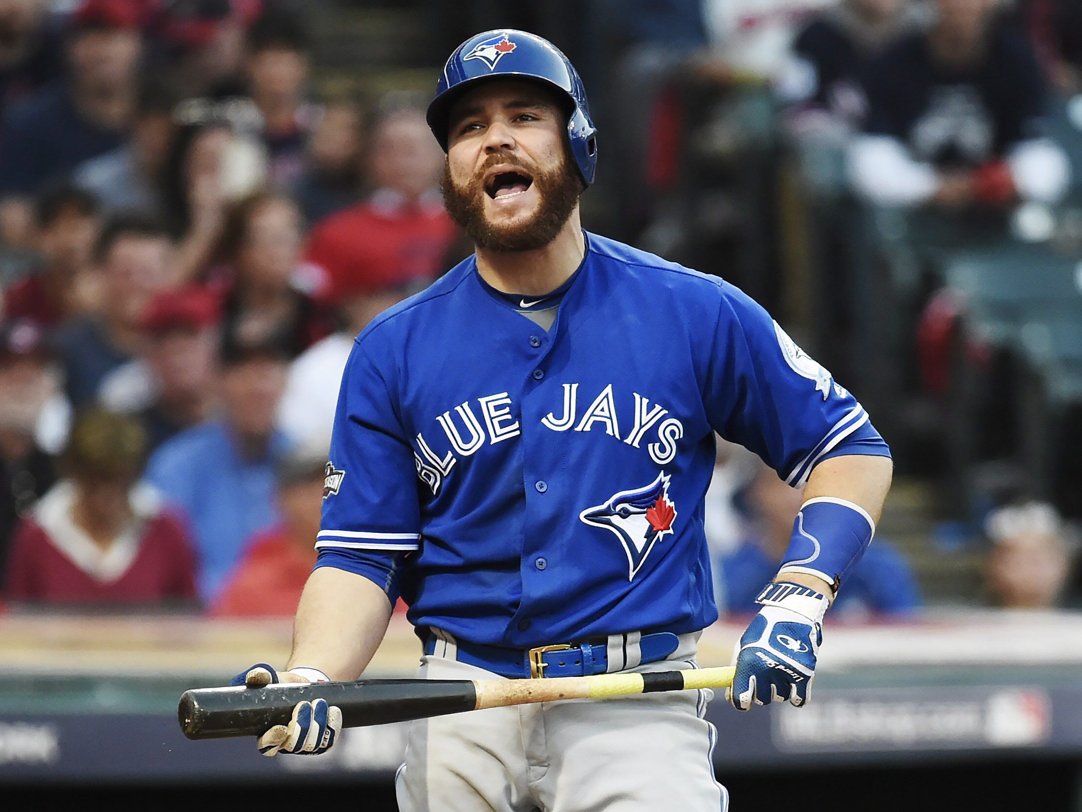 Toronto Blue Jays catcher Russell Martin (55) reacts at home plate against the Cleveland Indians during seventh inning, game two American League Championship Series baseball action in Cleveland on Saturday, October 15, 2016. THE CANADIAN PRESS/Nathan Denette