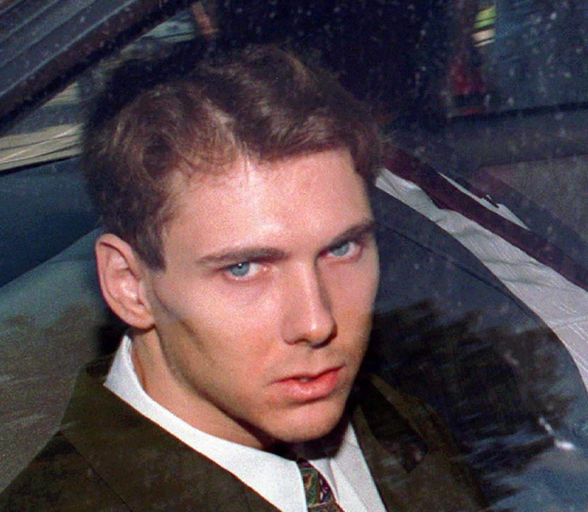 SPECIAL FOR THE TORONTO STAR (CPT104 - Aug. 31)--Paul (Teale) Bernardo arrives in the back of a police car at the St. Catherines, Ont., court house in this Aug. 5, 1993 file photo. (CP PHOTO) 1996 (str/Phil Snell)